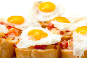 Baguette Slice with Ham and Fried Quail Egg
