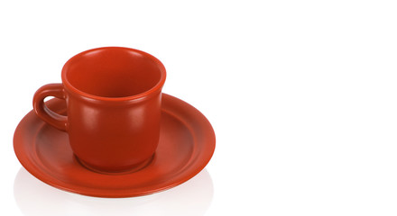 Red cup on a red saucer