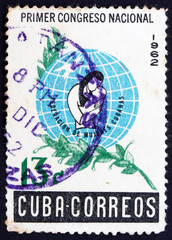 Naklejka premium Postage stamp Cuba 1962 Mother with Child