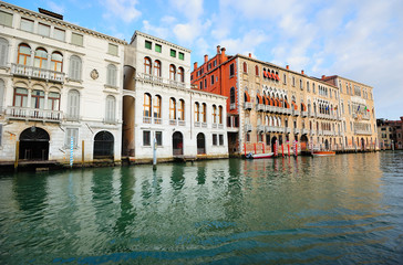Fototapeta na wymiar View to old palazzos (palaces) along Grand Canal in Venice