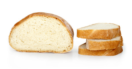 The cut loaf of bread isolated on white