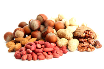 assortment of tasty nuts, isolated on white
