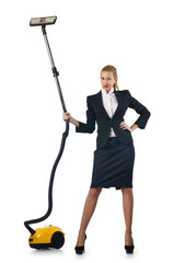 Businesswoman doing vacuum cleaning on white