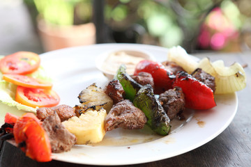 beef kababs on the grill closeup