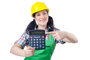 Woman builder with calculator on white
