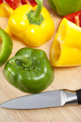 Mixed peppers on chopping board
