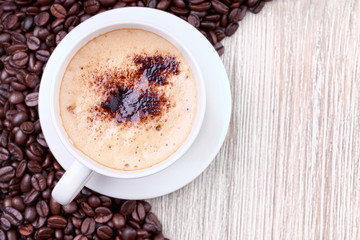 Coffee cup  with roasted coffee beans