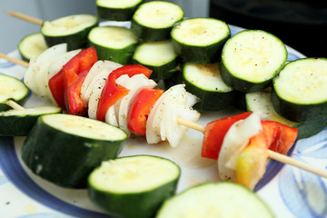 Vegetable skewers on plate ready to eat.