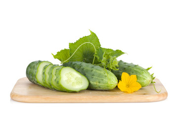 Ripe sliced cucumber on cutting board