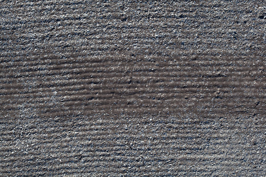 The texture of the old ruberoid. Close-up.