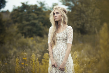 beautiful girl in a summer field