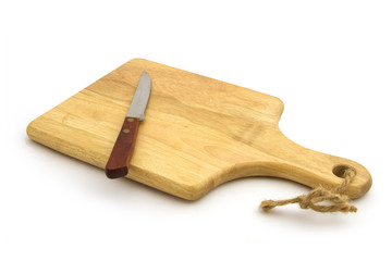Wooden cutting board with knife on white background