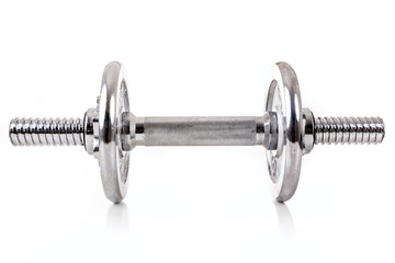 Chromed dumbbell weight over white background