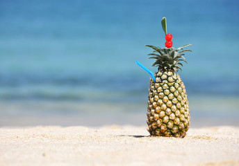 Pineapple cocktail on a tropical beach