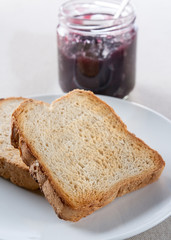 Plate of toast with jam