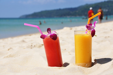 Pair of fruit shakes on the tropical beach