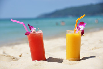 Pair of fruit shakes on the tropical beach