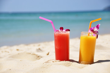Pair of fruit shakes on the tropical beach