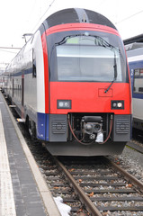 Obraz premium Passenger train at a station