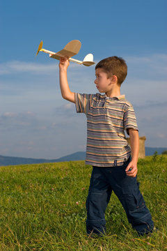 Boy playing with model airplane &copy; Krzysztof Nogawczyk
