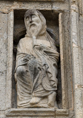 Old man in Holy Portal in Compostela cathedral