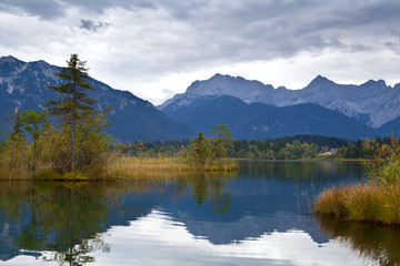 Fototapeta premium Barmsee and Alps at clouded weather