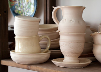 Pottery examples on the shelf in the school