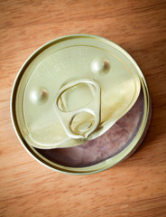 Fun smile of opened food can top view