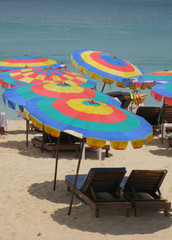 Colorful sun umbrellas at Surin beach of Phuket island