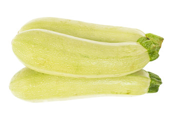 The fresh zucchini isolated on white background