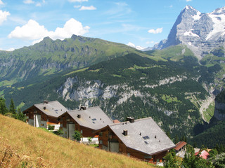 Fototapeta premium Holiday cottages in Muerren, famous Swiss skiing resort