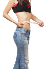woman measuring her wais