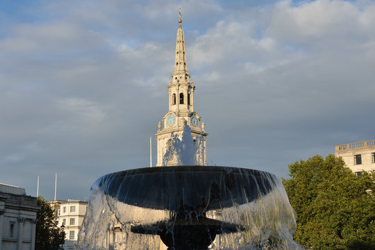 Fountain at trafalgar square overlooking st Martins in the Field