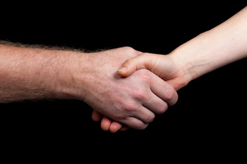 Hand shake between a man and woman