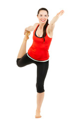 Obraz na płótnie Canvas Happy woman doing a yoga stretch