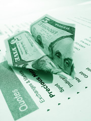 Five dollar airplane on a financial report