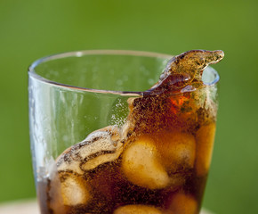cola with ice in detail