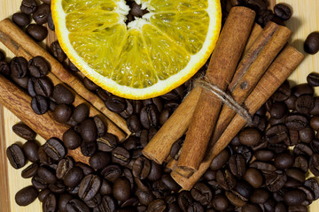 Coffee beans, cinnamon and orange