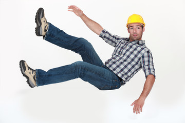 A construction worker in freefall.