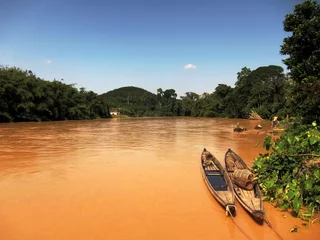 Fototapete Rund Boats on muddy river © Dane Mo