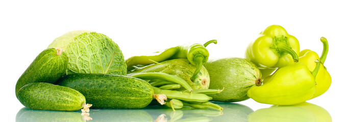 fresh green vegetables isolated on white
