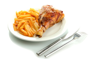 Roast chicken with french fries on plate, isolated on white