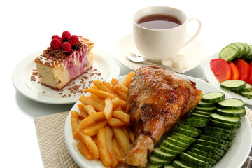 Roast chicken cutlet with boiled potatoes and  vegetables, cup