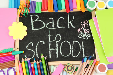 The words 'Back to School' written in chalk