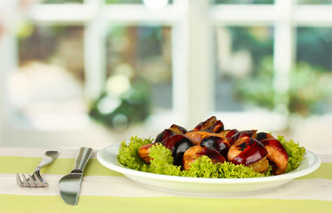 roasted chestnuts with lettuce in the plate
