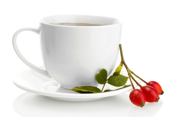 cup of tea with hip roses, isolated on white