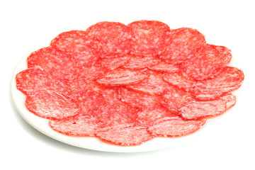 tasty sausage on plate, isolated on white