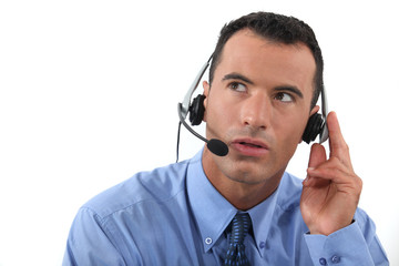 Man speaking into a hands-free headset