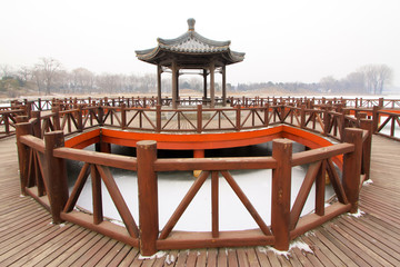 pavilion in a park, traditional Chinese architectural style