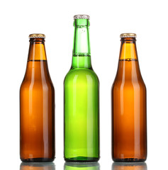 three bottles of beer isolated on white